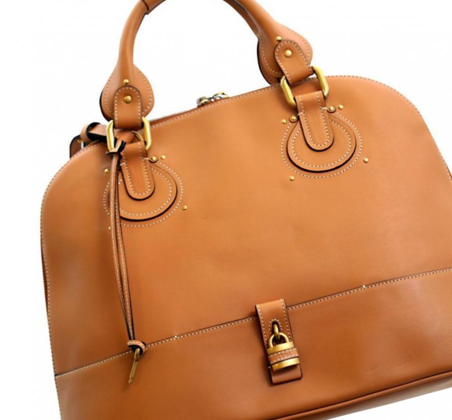 Как отличить настоящие брендовые сумки?
